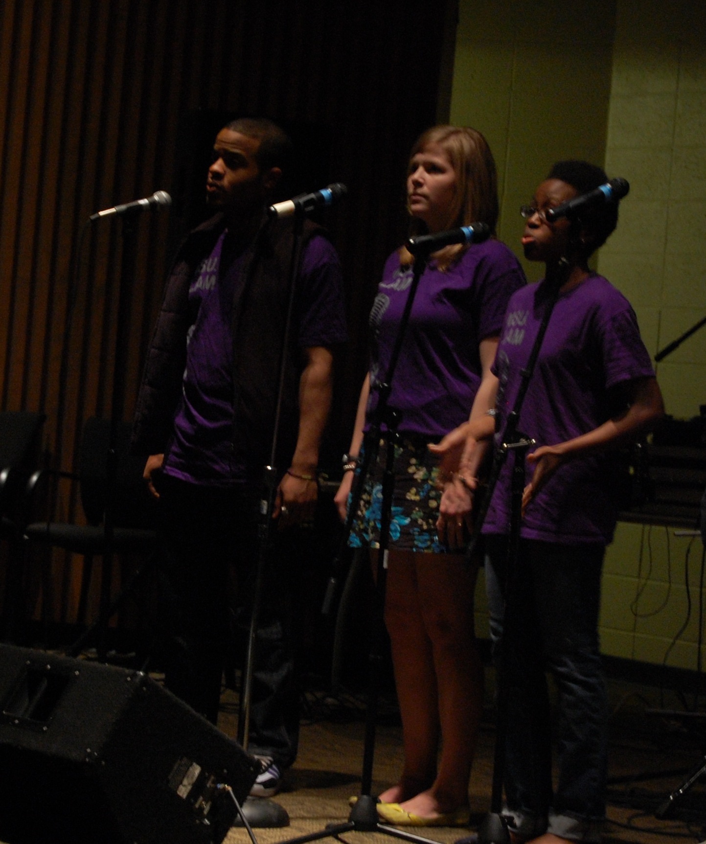 Michelle Hooks, on right, with MSU Poetry Slam members. (Photo by Solomon Martin)